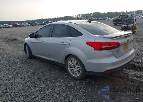 2016 Ford Focus Titanium из США, поврежденный, VIN 1FADP3J23GL228684